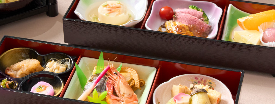 Assortment of Japanese dishes in a bento box